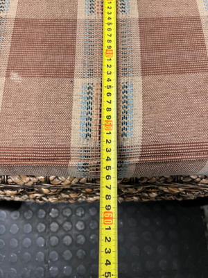 Woven Wicker and Dark Wood Armchair — Fair Used Condition with Faded Cushion