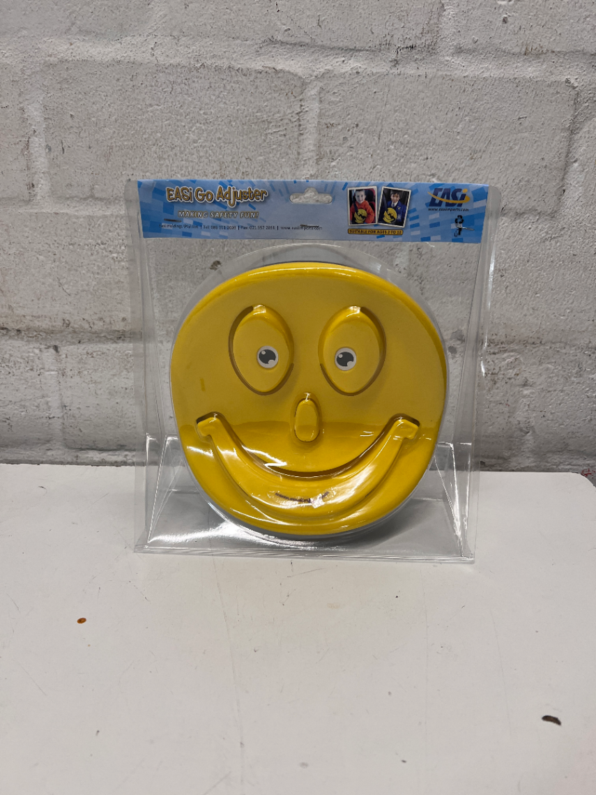 Yellow Easi Go Smiley Face Seatbelt Adjuster — Unused in Original Unopened Packaging