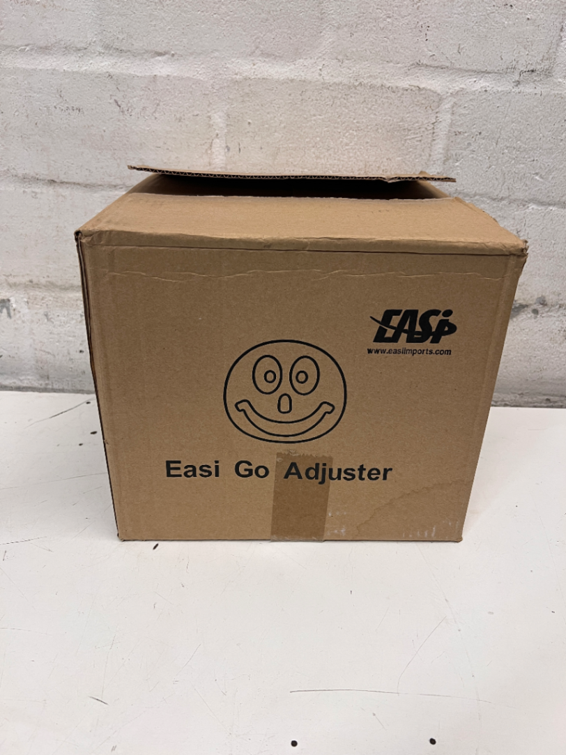 Yellow Easi Go Smiley Face Seatbelt Adjuster — Unused in Original Unopened Packaging