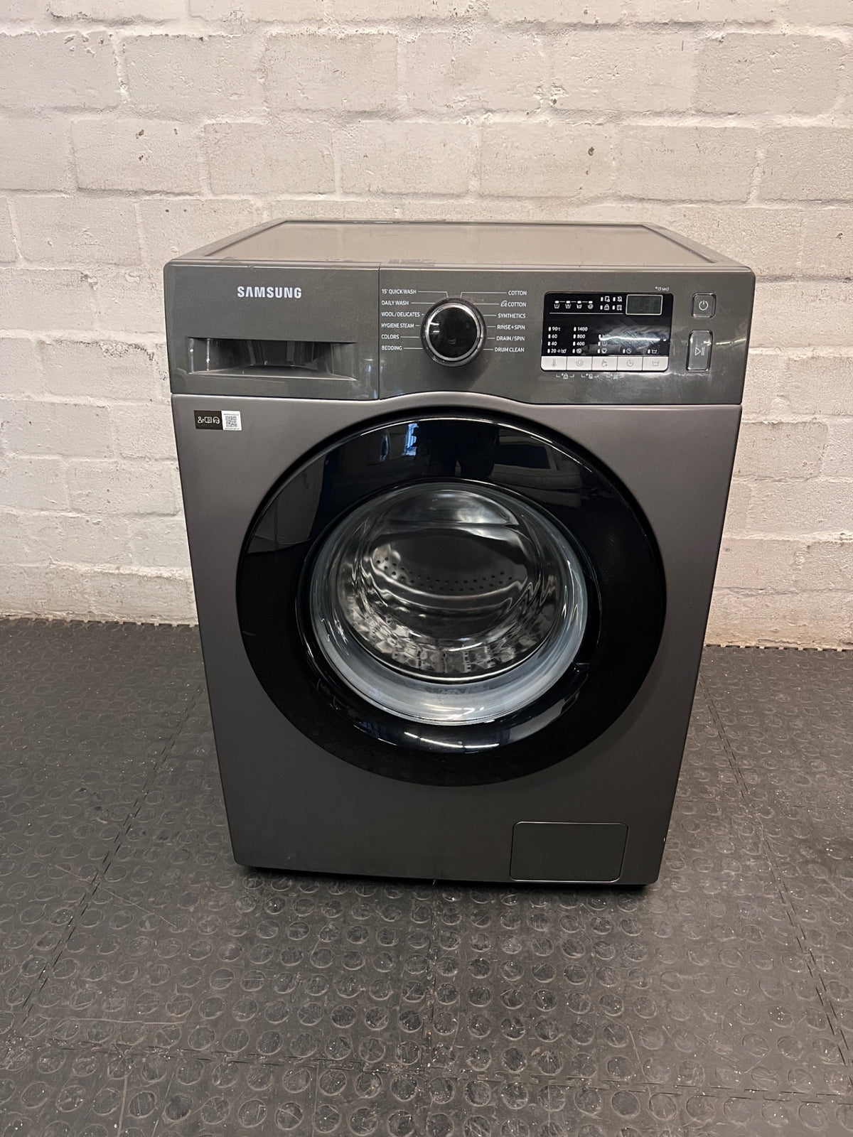 Samsung Front Loader Washing Machine in Grey — Good Working Order with Fair Exterior Wear – main front view