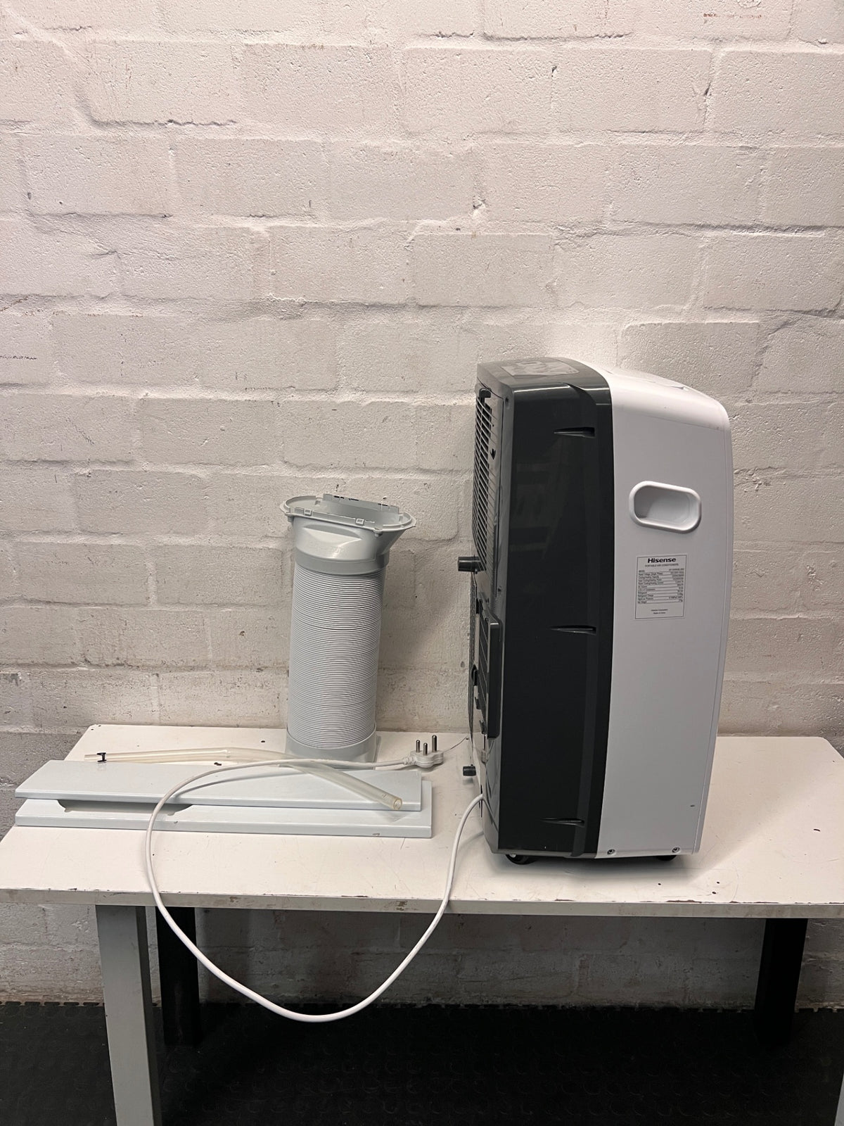 White Hisense Portable Air Conditioner with Exhaust Kit — Good Working Order – back view