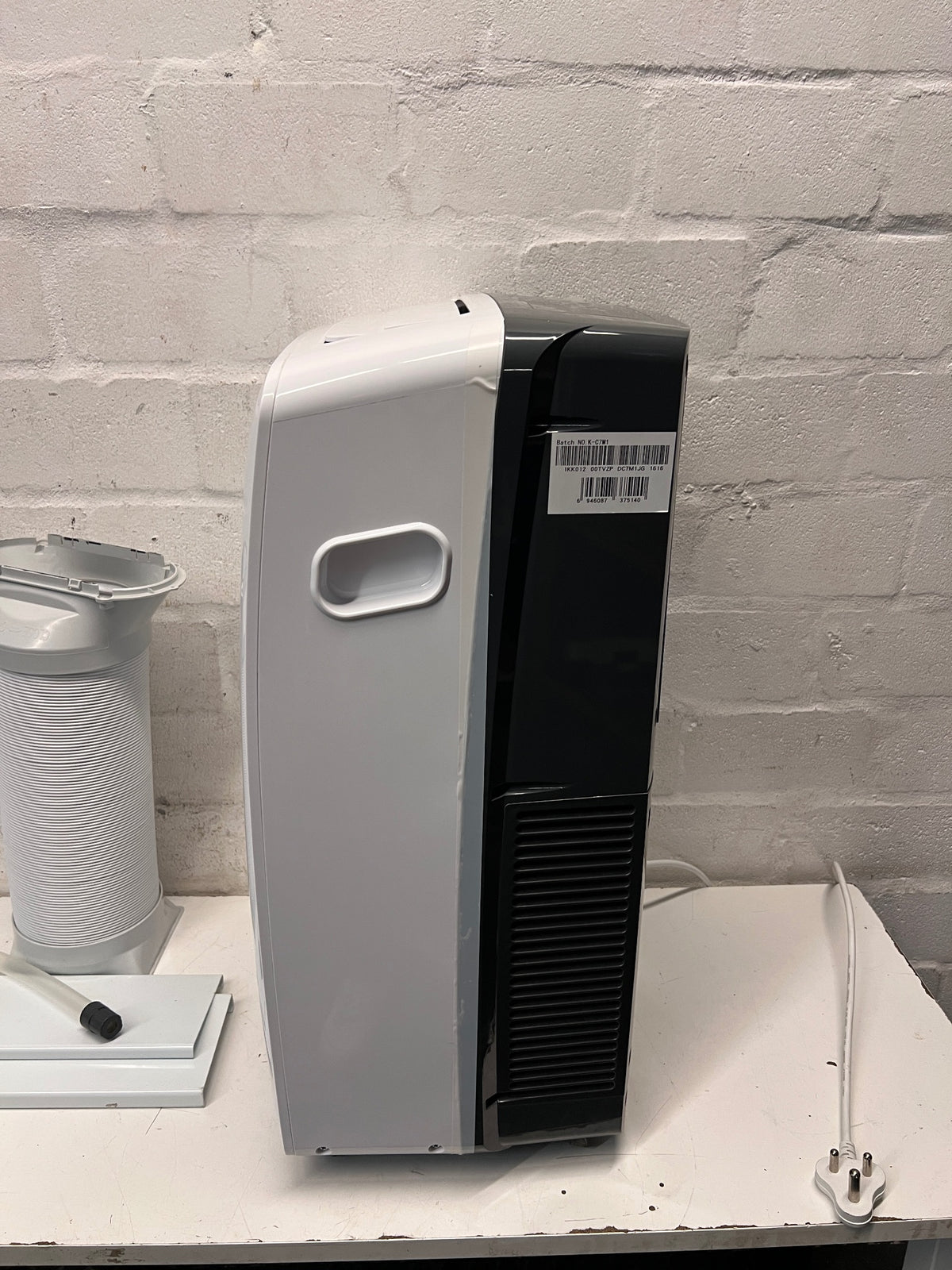 White Hisense Portable Air Conditioner with Exhaust Kit — Good Working Order – side view