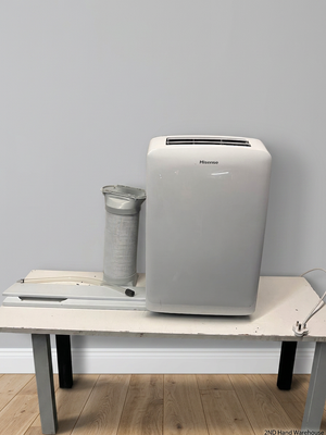 White Hisense Portable Air Conditioner with Exhaust Kit — Good Working Order – styled product image
