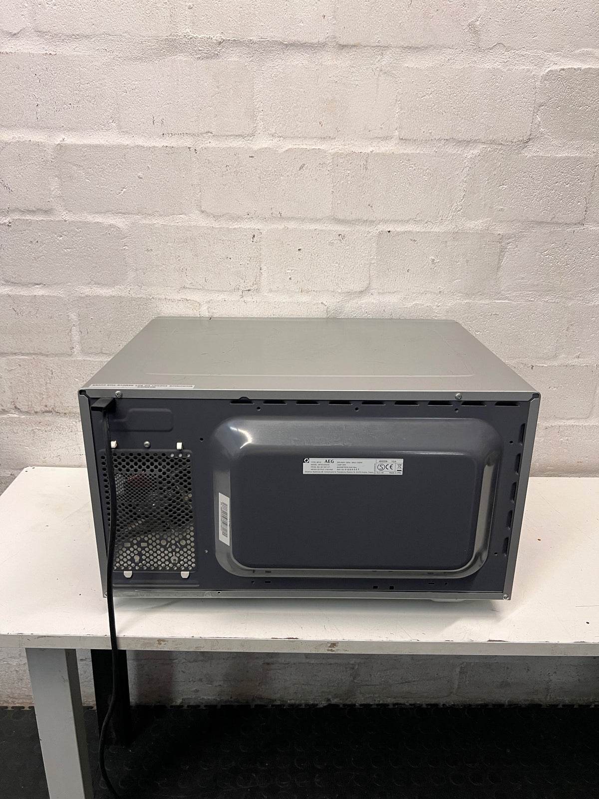 AEG Silver Countertop Microwave — Good Working Order – back view