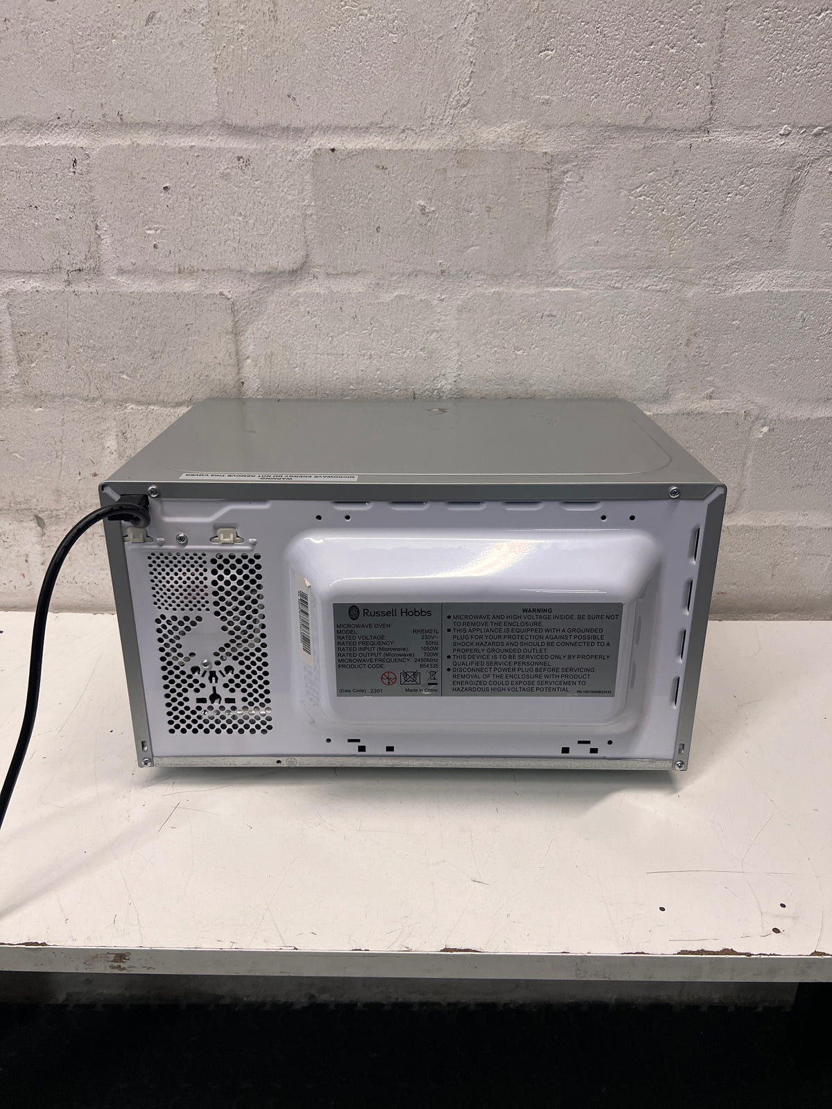 AEG Countertop Microwave with Mirrored Finish — Working; Well Used Condition – back view