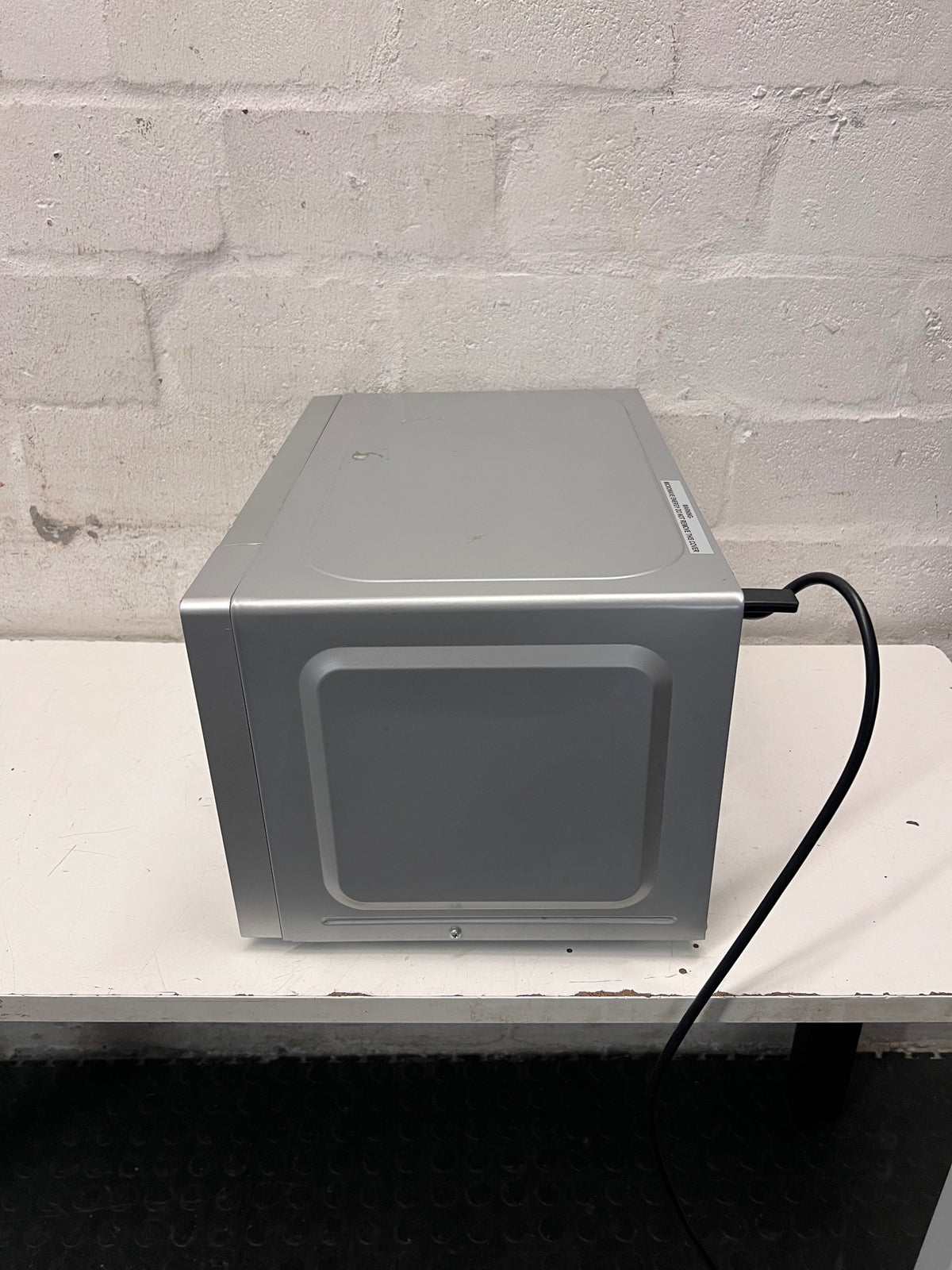 AEG Countertop Microwave with Mirrored Finish — Working; Well Used Condition – condition detail