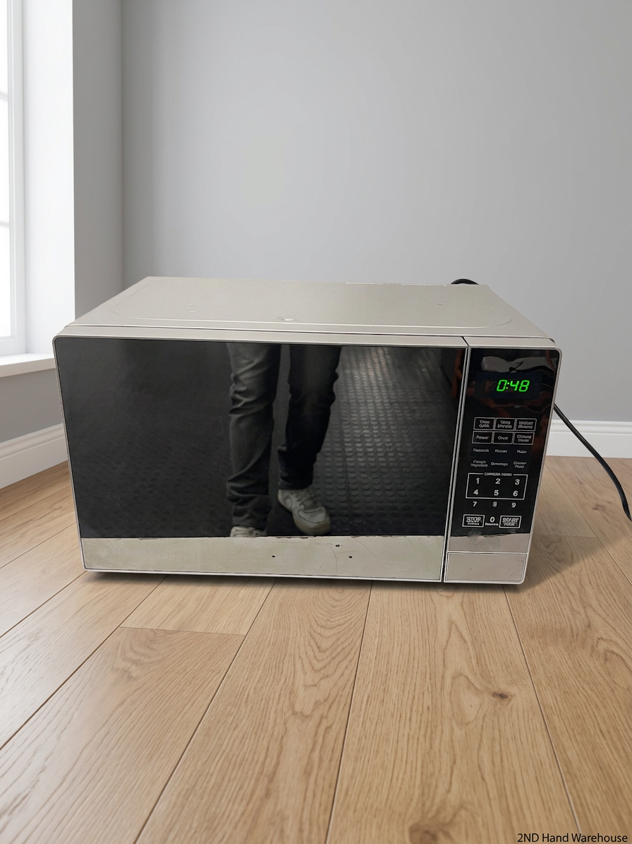 AEG Countertop Microwave with Mirrored Finish — Working; Well Used Condition – styled product image