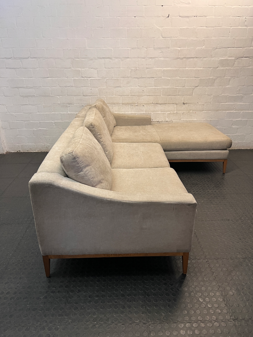 Neutral Fabric L-Shape Sectional Couch with Wooden Base — Well Used L-Shape Couch – back view