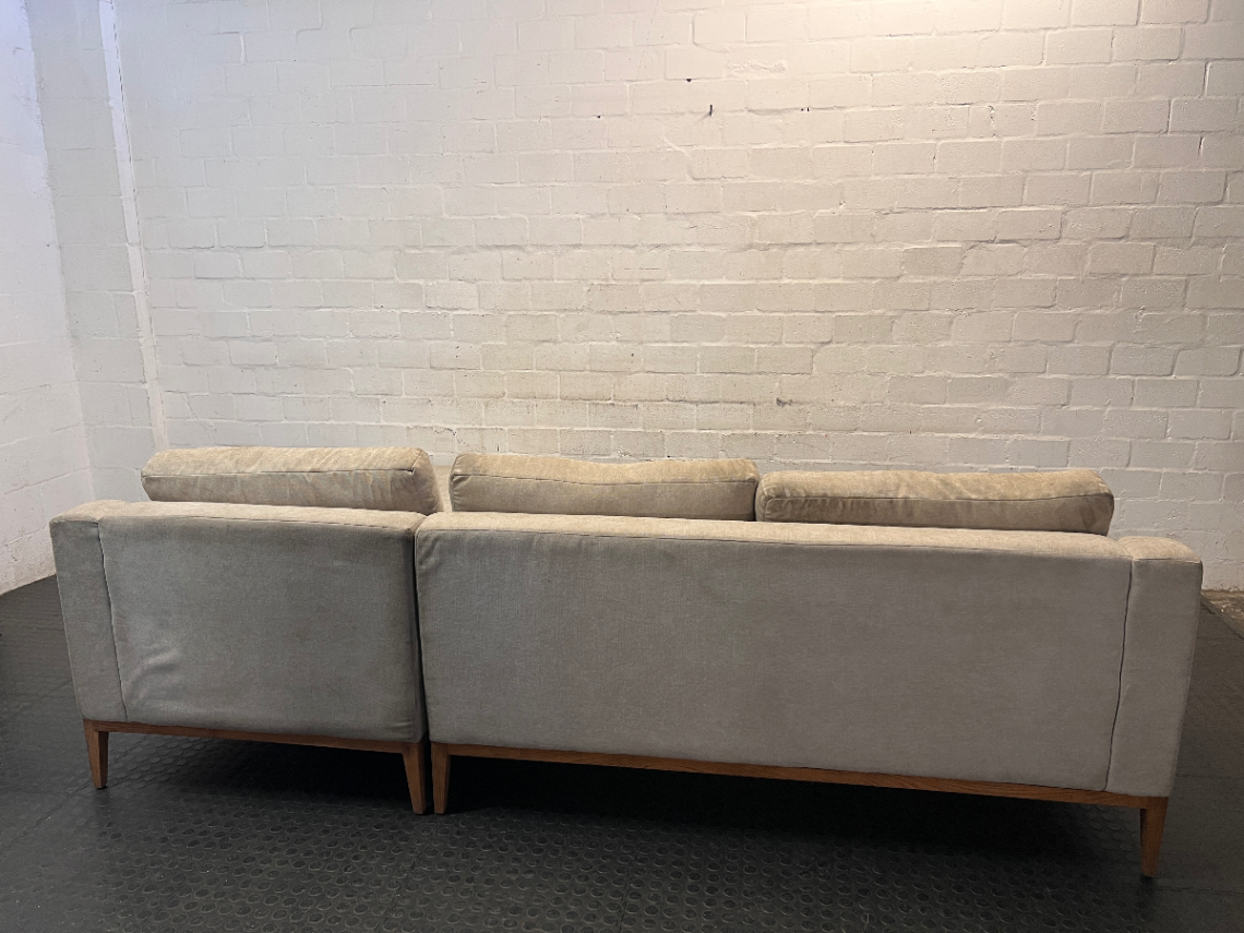 Neutral Fabric L-Shape Sectional Couch with Wooden Base — Well Used L-Shape Couch – condition detail