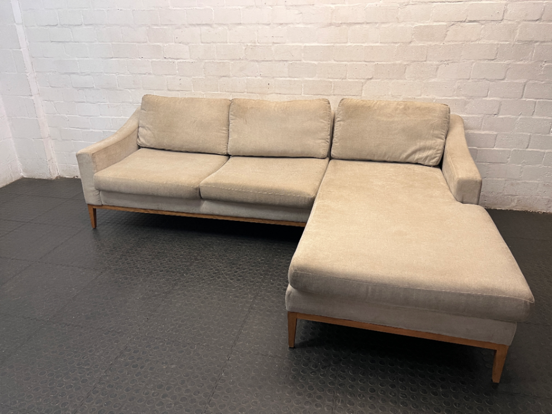 Neutral Fabric L-Shape Sectional Couch with Wooden Base — Well Used L-Shape Couch – main front view