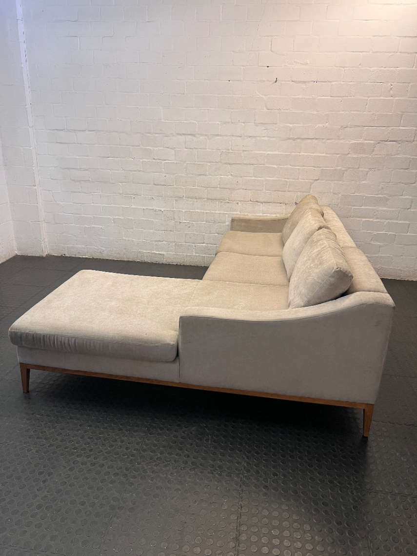 Neutral Fabric L-Shape Sectional Couch with Wooden Base — Well Used L-Shape Couch – side view