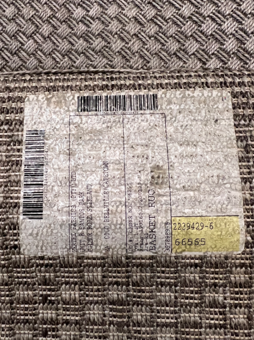 Large Woven Beige Area Rug — Well Used Rug – back view
