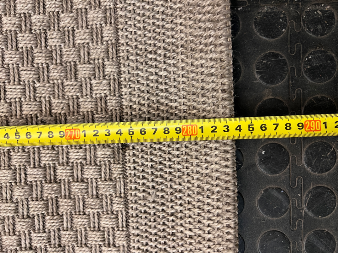 Large Woven Beige Area Rug — Well Used Rug – width measurement