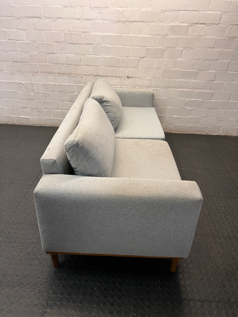 Modern Grey 3 Seater Couch with Tapered Wooden Legs — Small Tear on Cushion – top view