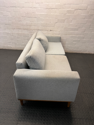 Modern Grey 3 Seater Couch with Tapered Wooden Legs — Small Tear on Cushion – top view