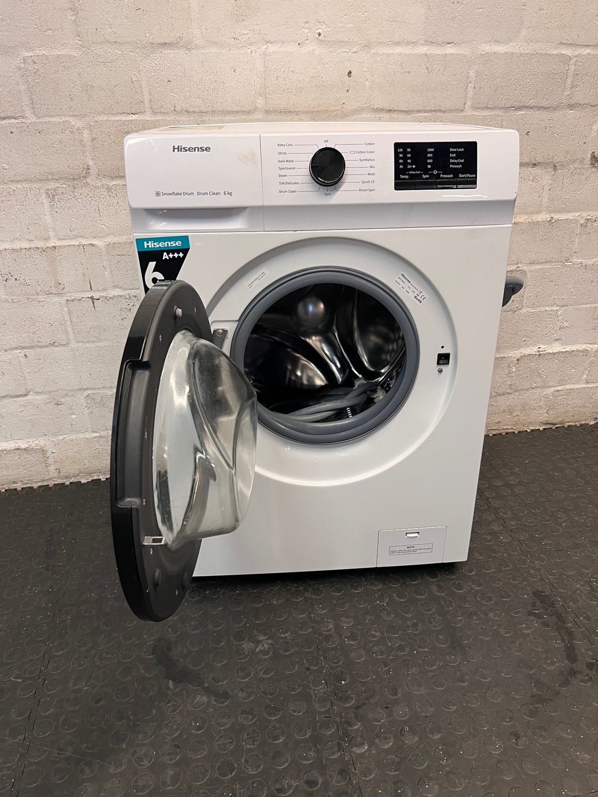 Hisense 6kg Front-Loader Washing Machine in White — Good Working Order; Well Used – side view