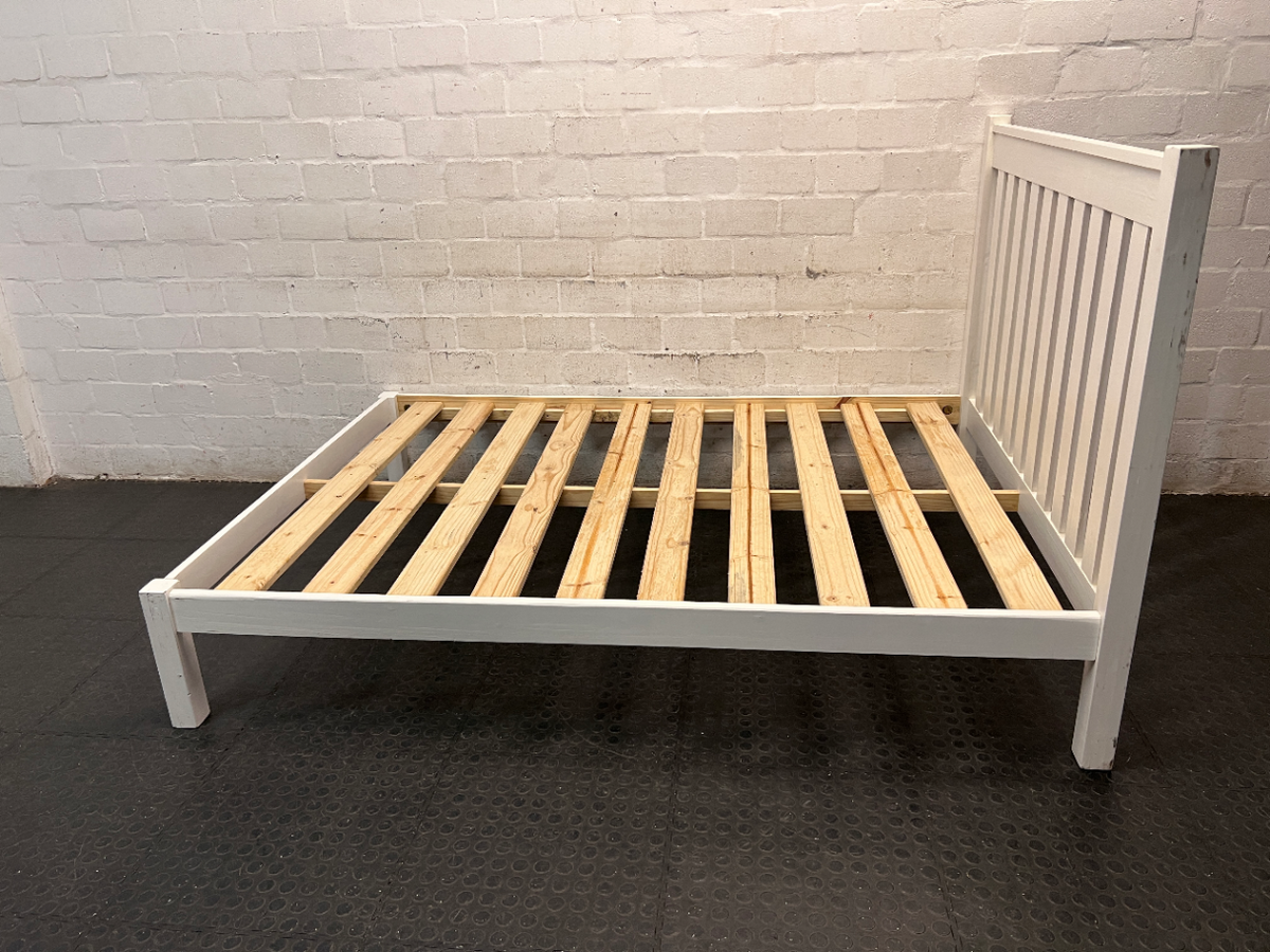 White Wooden Double Bed Frame with Slatted Headboard — Fair Condition with General Wear – side view