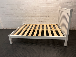 White Wooden Double Bed Frame with Slatted Headboard — Fair Condition with General Wear – side view