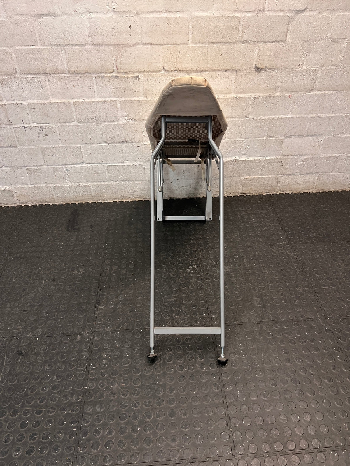 Grey Metal Folding Ironing Board — Fair Condition with Visible Surface Staining – back view