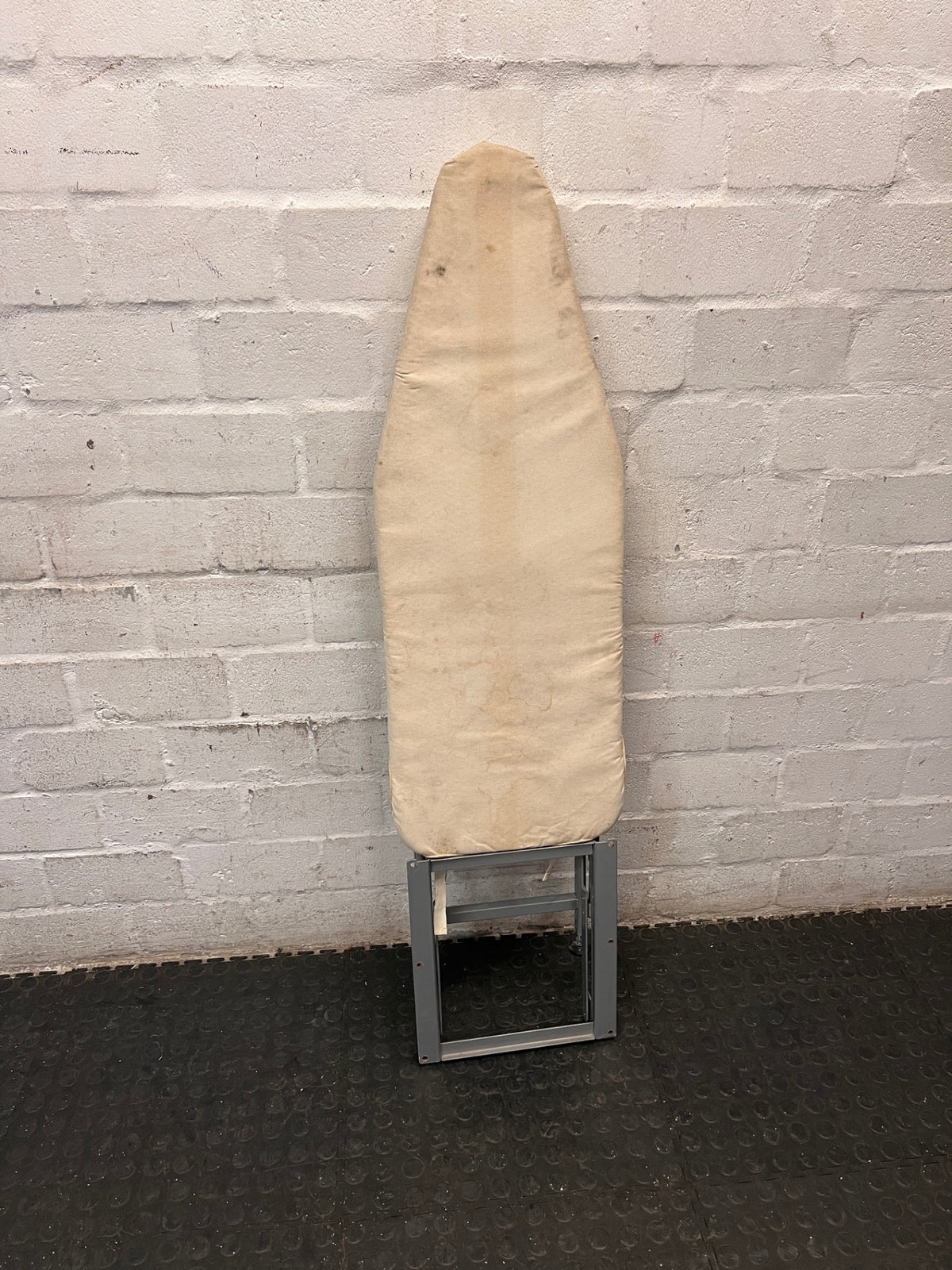 Grey Metal Folding Ironing Board — Fair Condition with Visible Surface Staining – condition detail