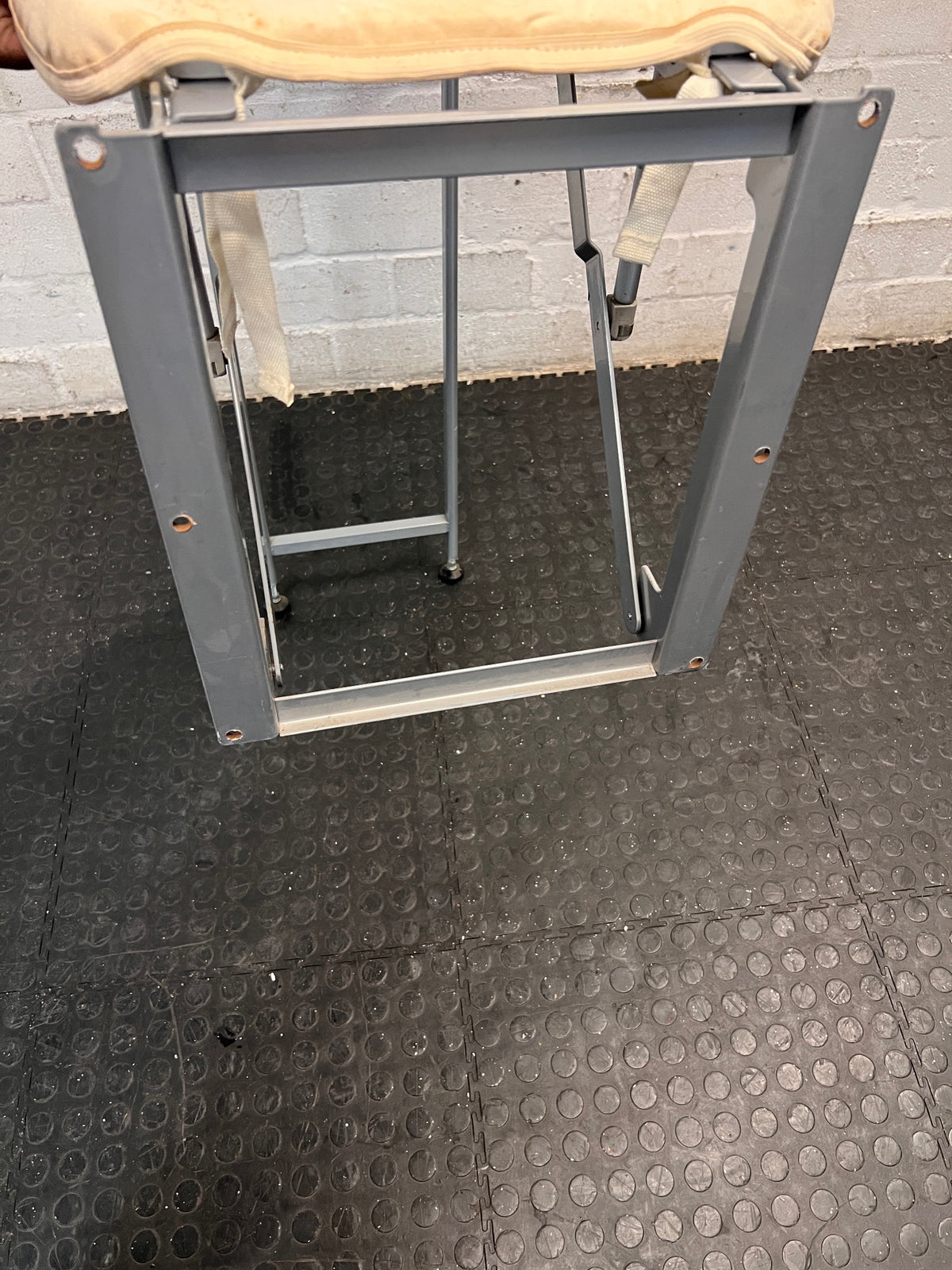 Grey Metal Folding Ironing Board — Fair Condition with Visible Surface Staining – side view