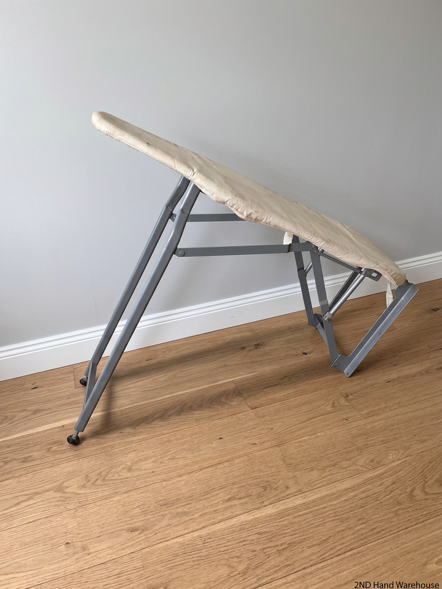 Grey Metal Folding Ironing Board — Fair Condition with Visible Surface Staining – styled product image