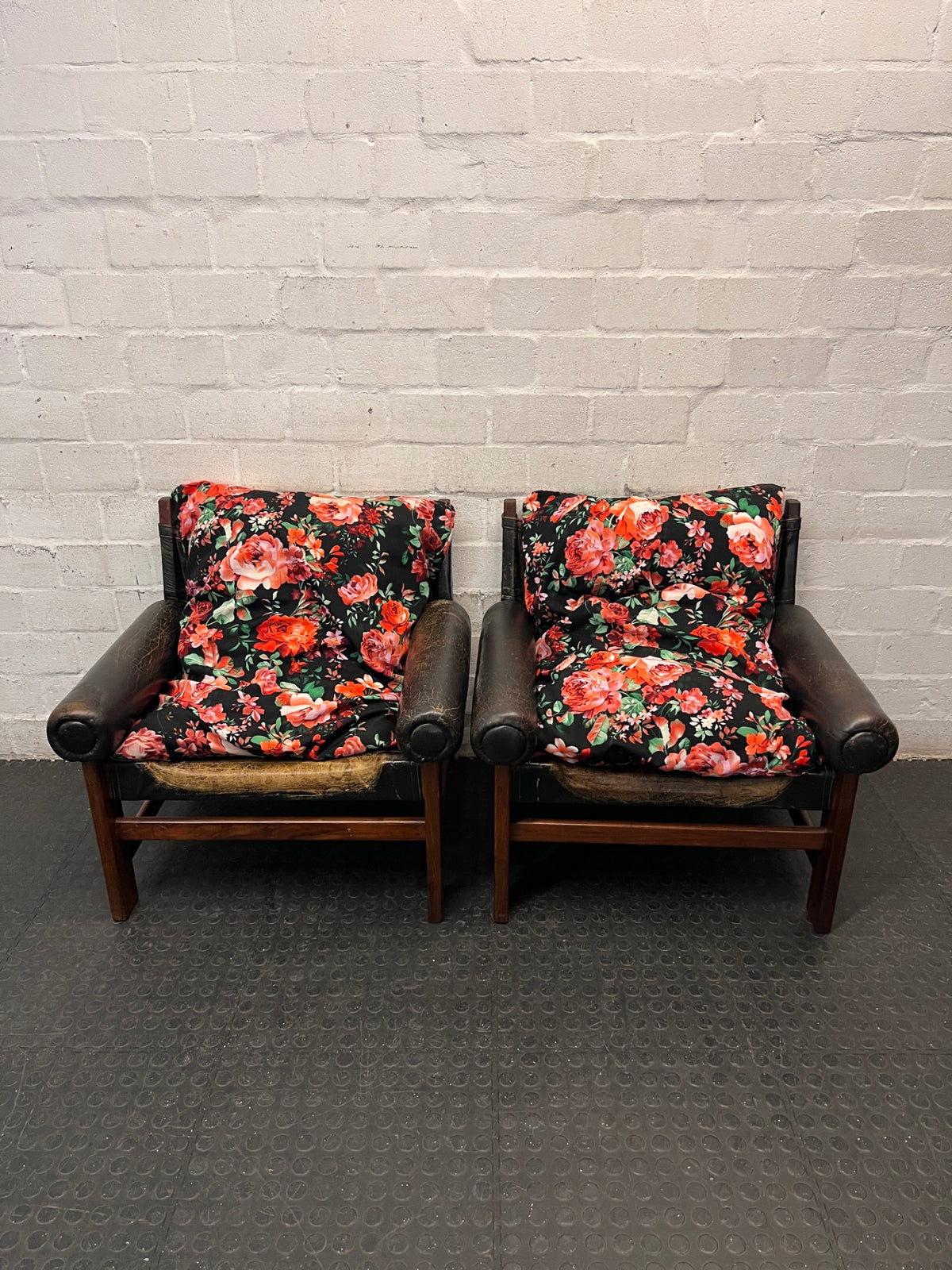 Vintage Brown Leather Armchair with Floral Cushion — Well Used with Significant Leather Wear – side view