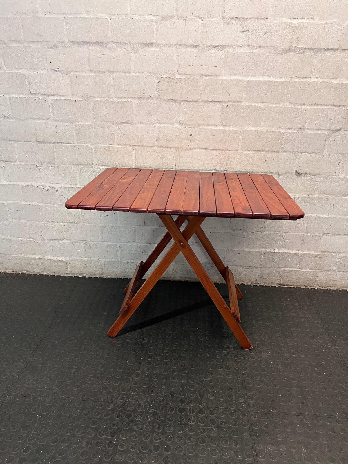 Foldable Slatted Timber Table in Warm Brown — Fair Condition with Visible Wear – main front view