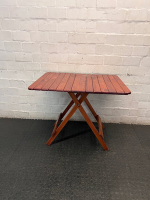 Foldable Slatted Timber Table in Warm Brown — Fair Condition with Visible Wear – main front view