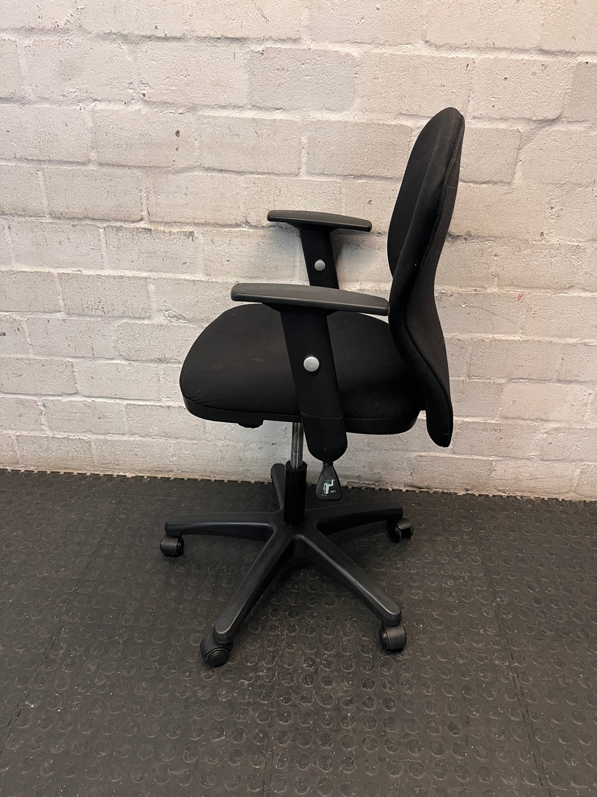 Black Fabric Mid-Back Office Chair with Armrests — Broken Wheels – side view