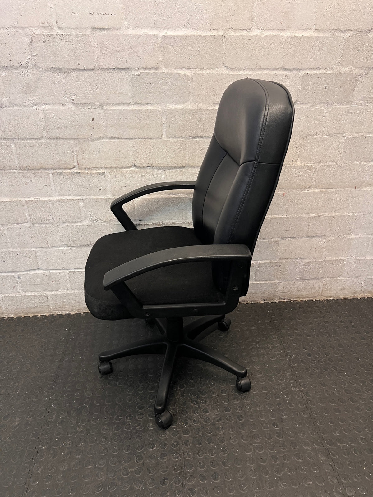 High-Back Black Swivel Office Chair — Broken Wheels on Chair Base – side view