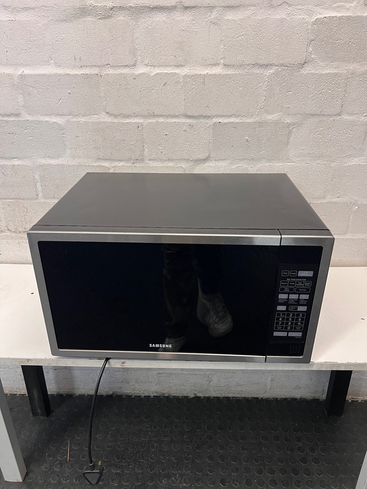 Samsung 55L Stainless Steel Microwave — Internal Light Inoperable and Slight Rust Inside – main front view