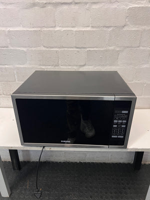 Samsung 55L Stainless Steel Microwave — Internal Light Inoperable and Slight Rust Inside – main front view