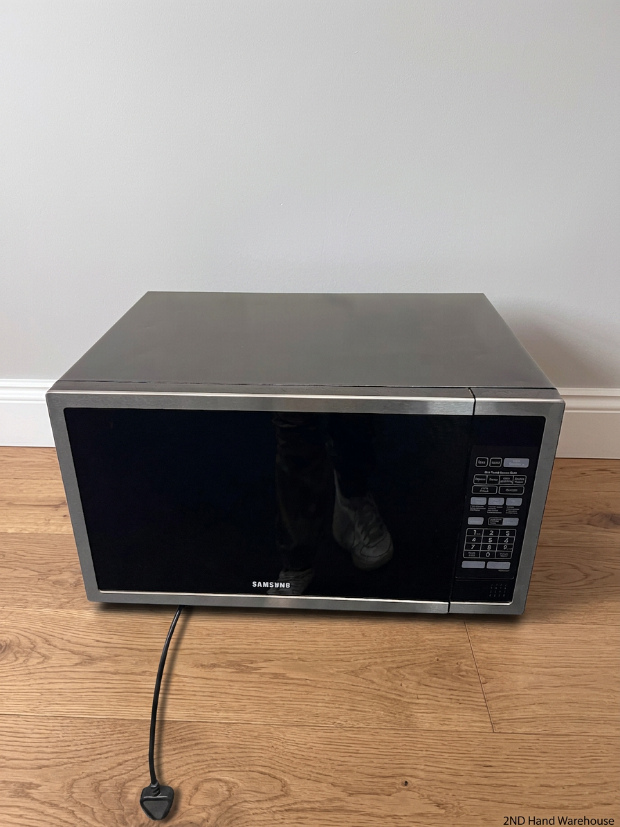 Samsung 55L Stainless Steel Microwave — Internal Light Inoperable and Slight Rust Inside – styled product image