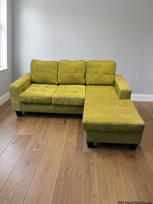 Green Textured Fabric L-Shape Corner Couch — Used; Fair Condition – styled product image