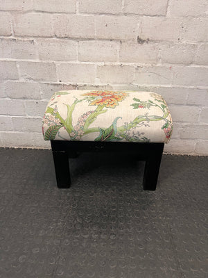 Floral Upholstered Ottoman with Black Timber Legs — Fair Condition With Visible Wear – main front view
