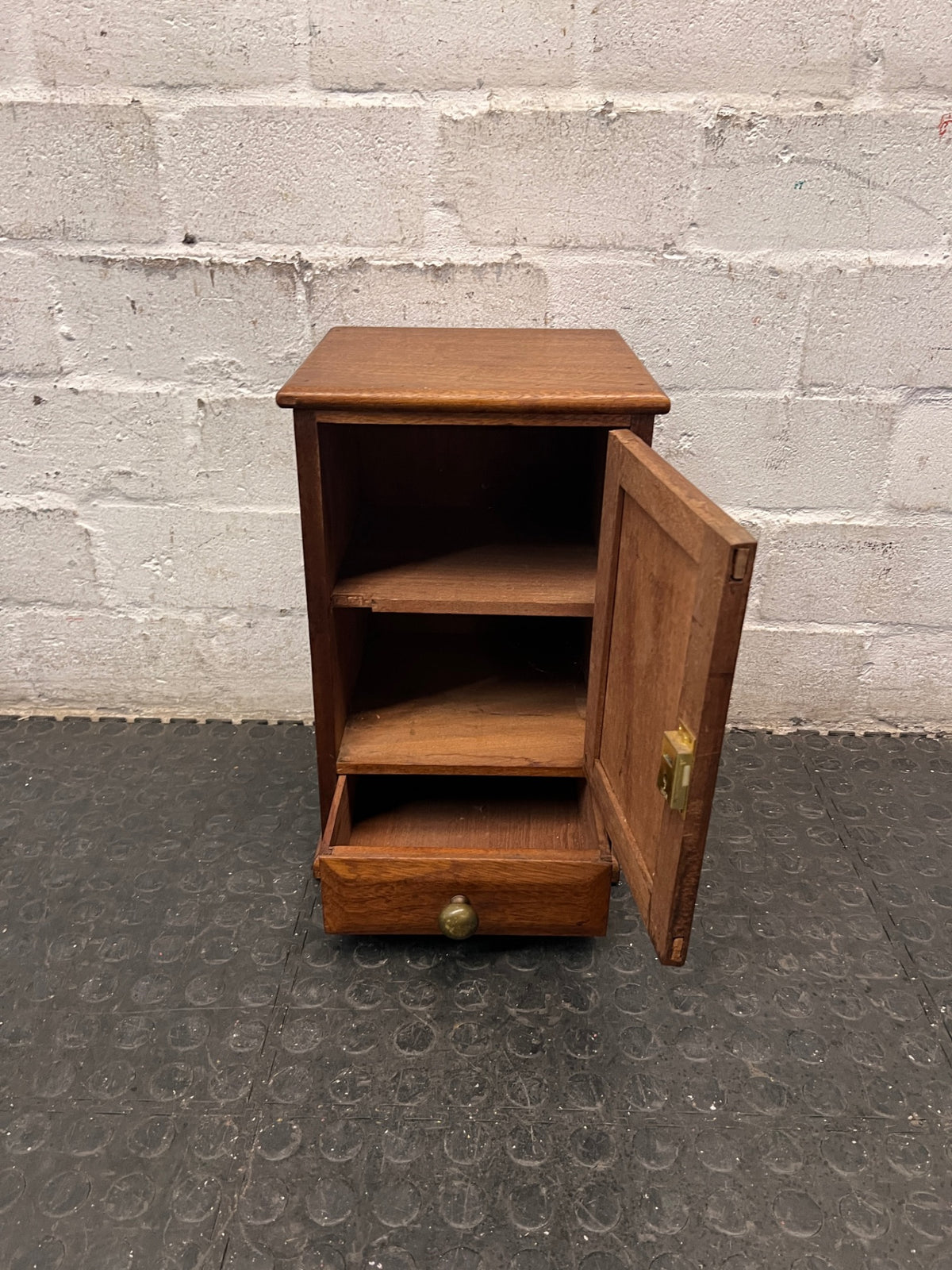 Compact Wooden Cabinet with Drawer — Fair Condition with Visible Wear – side view