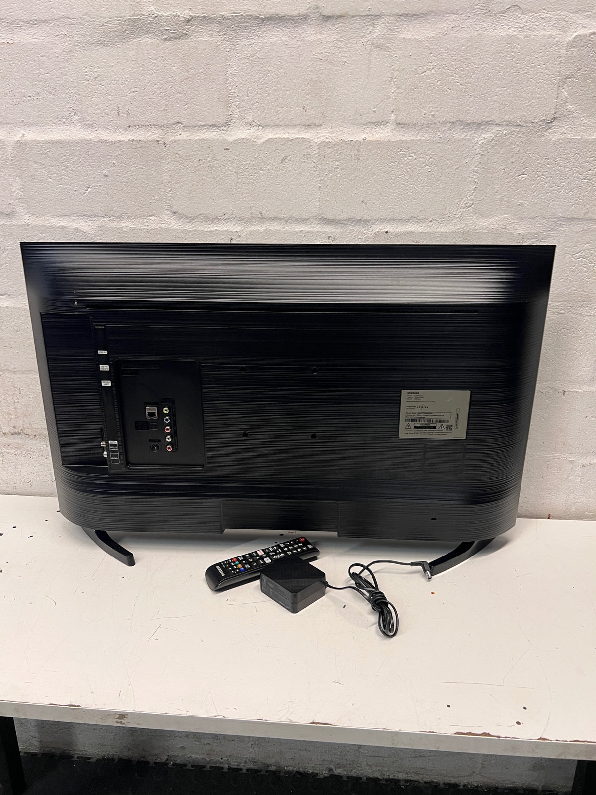 Samsung Flat-Screen Television with Stand — Good Working Order – back view