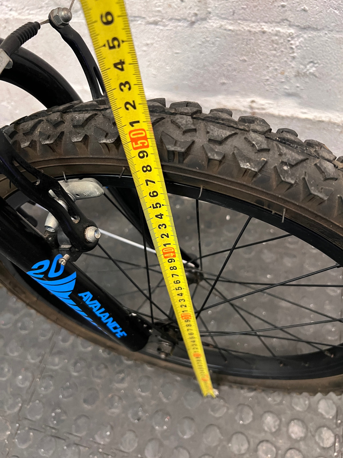 20 Inch Avalanche Mountain Bike in Black and Blue — Good Condition with Fair Wear – height measurement