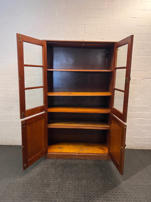 Tall Wooden Glass-Front Display Cabinet — Water Damage Present – side view