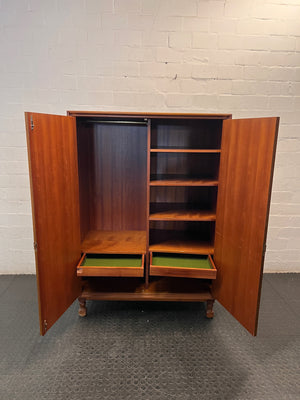 Classic Wooden Two-Door Panelled Cupboard — Two Broken Legs – side view