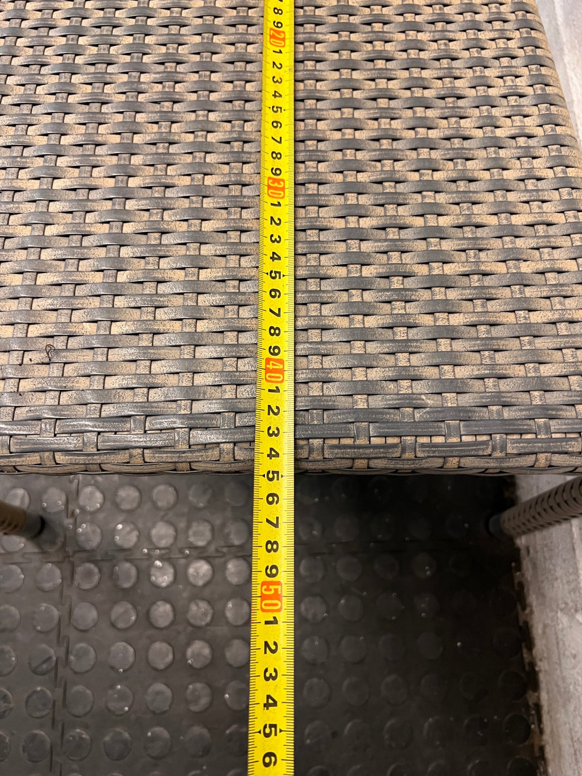 Grey Woven Synthetic Wicker Outdoor Chair — Well Used with Damaged Wicker Armrest – depth measurement