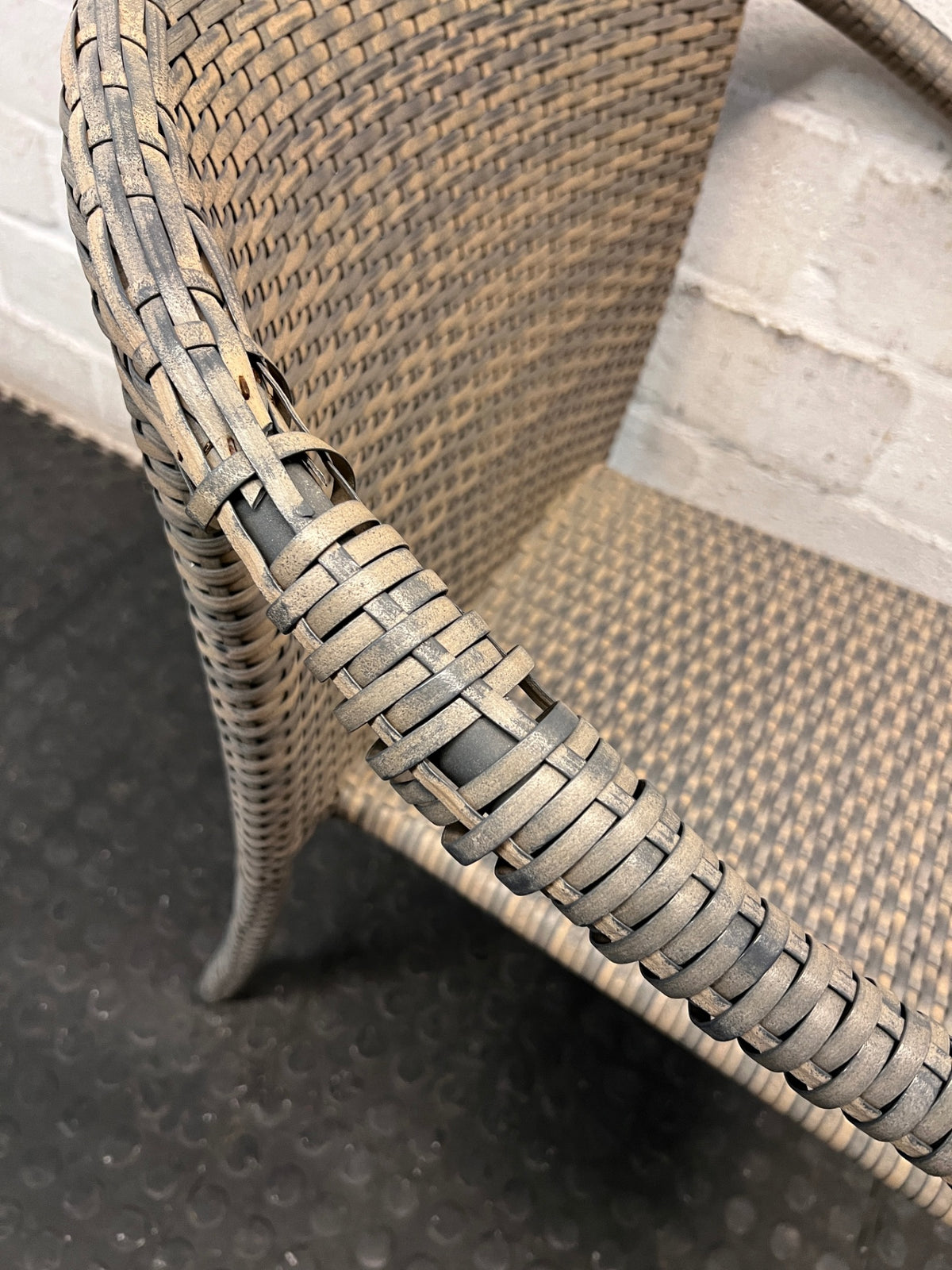 Grey Woven Synthetic Wicker Outdoor Chair — Well Used with Damaged Wicker Armrest – top view