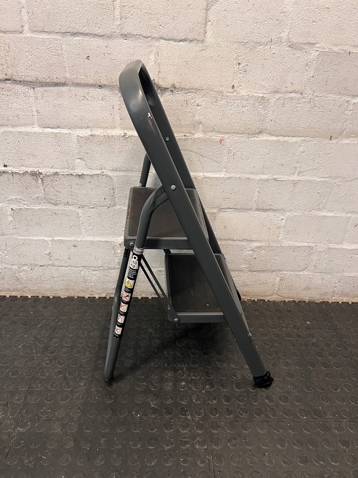 Strand 2-Step Folding Metal Ladder with Handrail — Well Used with Visible Wear – side view