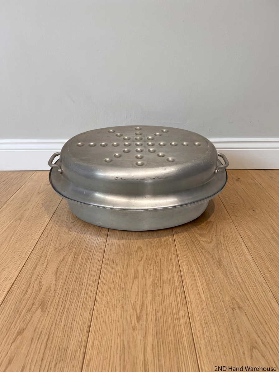 Oval Stainless Steel Roasting Dish with Lid — Well Used with Surface Scratches – styled product image
