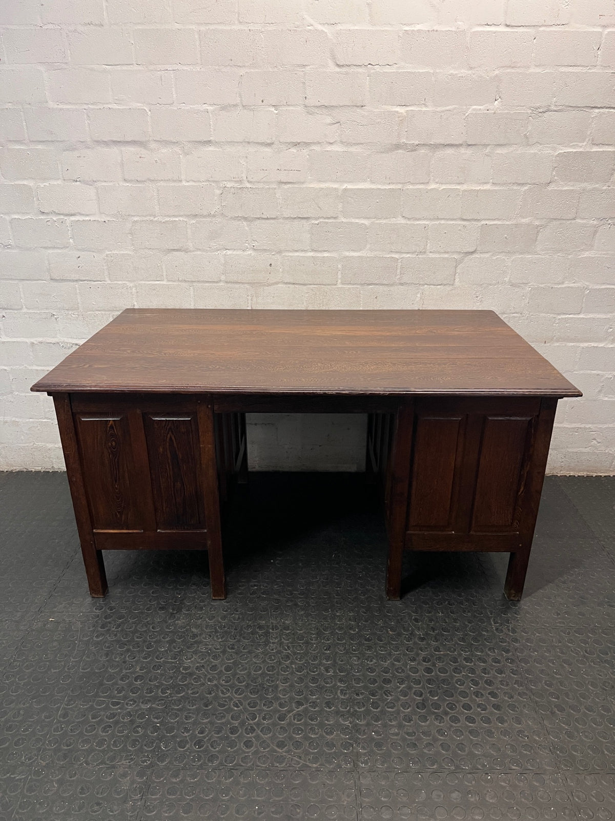 Classic Pedestal Wooden Office Desk with Cup Handles — Loose Top Surface and Age-Related Wear – back view