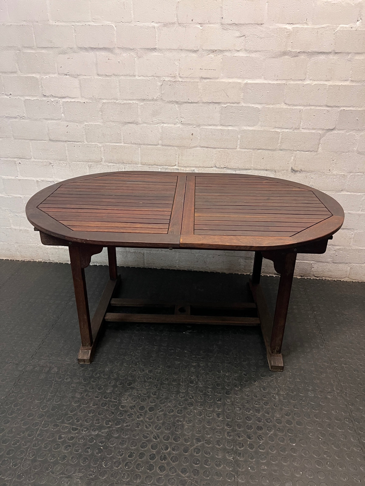 Oval Trestle-Style Wooden Outdoor Dining Table — Aged Wood with Worn Surface Finish – back view