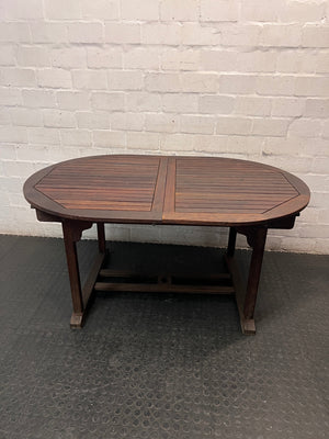 Oval Trestle-Style Wooden Outdoor Dining Table — Aged Wood with Worn Surface Finish – back view