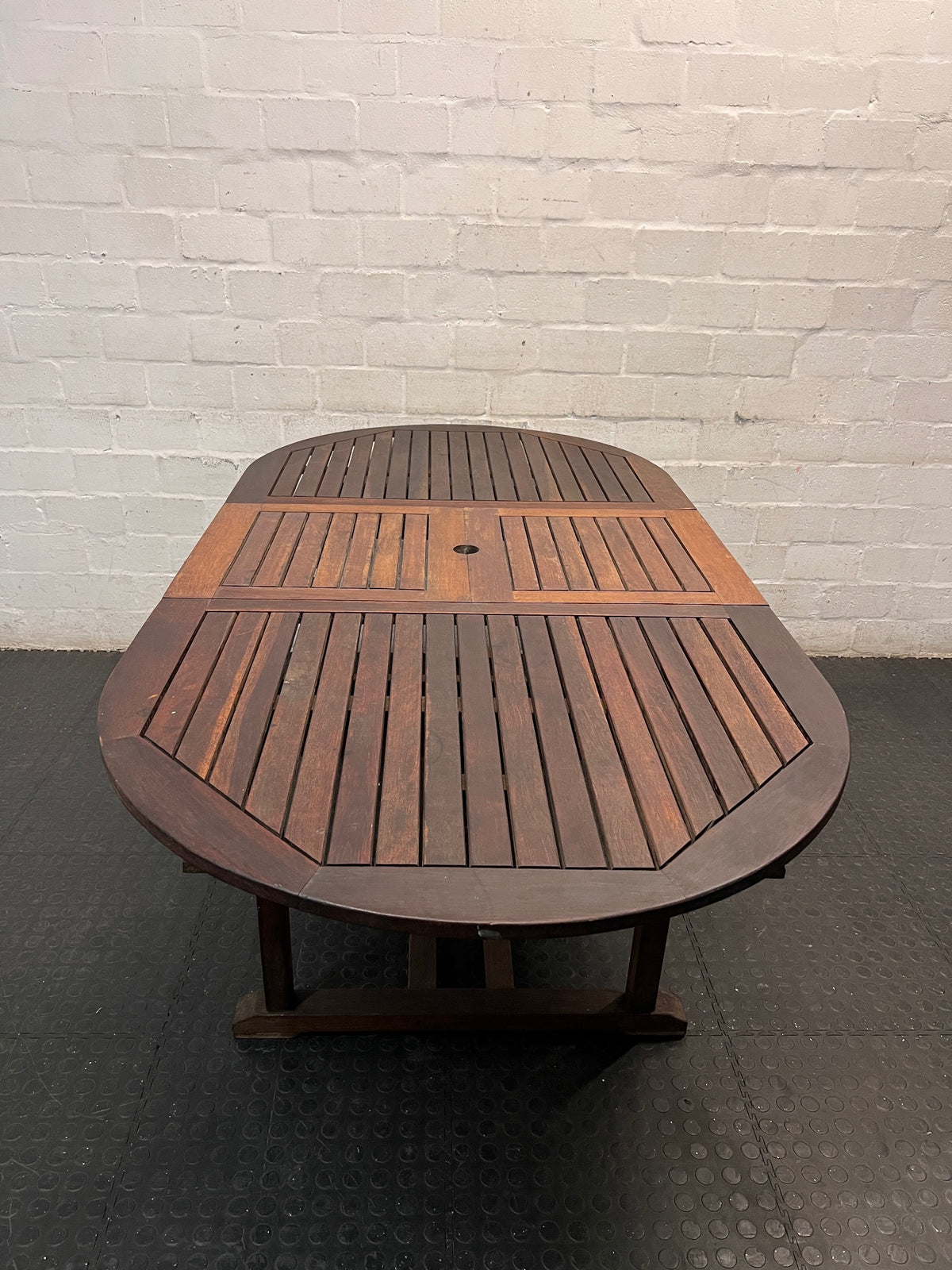 Oval Trestle-Style Wooden Outdoor Dining Table — Aged Wood with Worn Surface Finish – top view