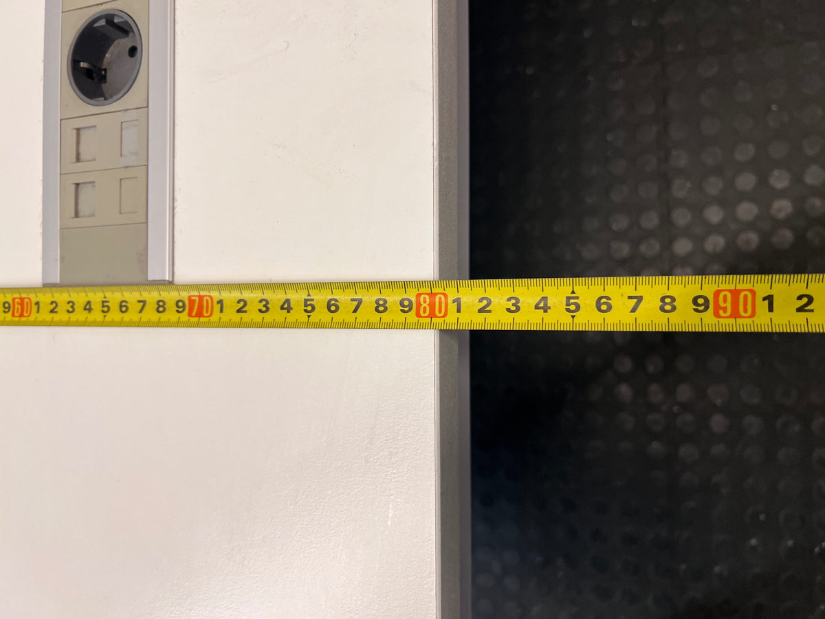 White Office Desk with Integrated Power Module — Signs of Transit Damage – depth measurement